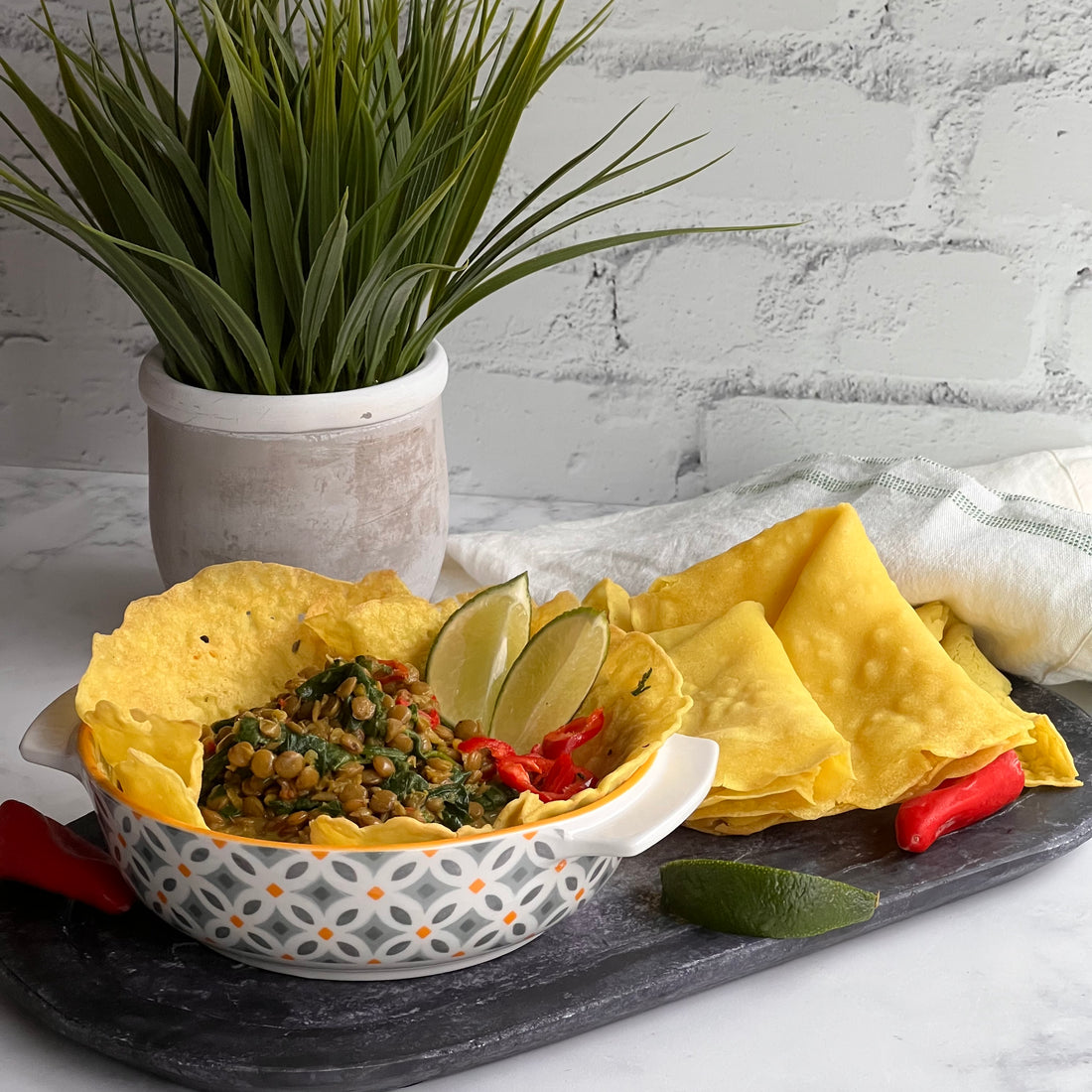 Green Power Lentils;Fast, easy, nutrient loaded meal with incredible exotic flavor. Meaty lentils simmered in delicate, fragrant, creamy green curry sauce with leafy spinach served in warm, sweet, crispy pancake flatbread to soak up all the goodness. Per serving: cal 321, fat 21g, sodium 994mg, carbs 25g (fiber 3g, sugar 6g) protein 7g Common Allergens:  soy , coconut